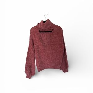 The impeccable pig slouchy cutout turtleneck sweater